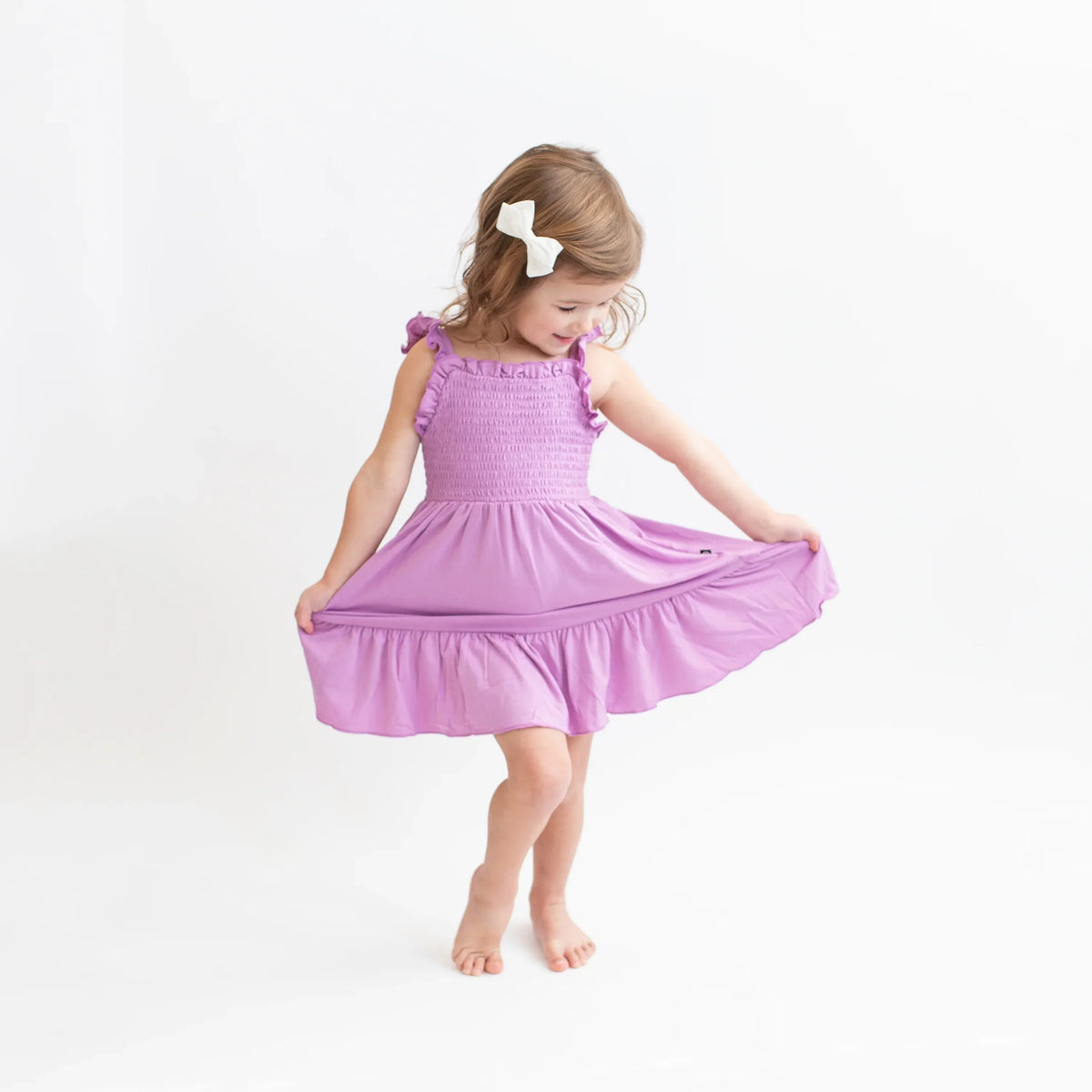 Smocked Dress in Poi