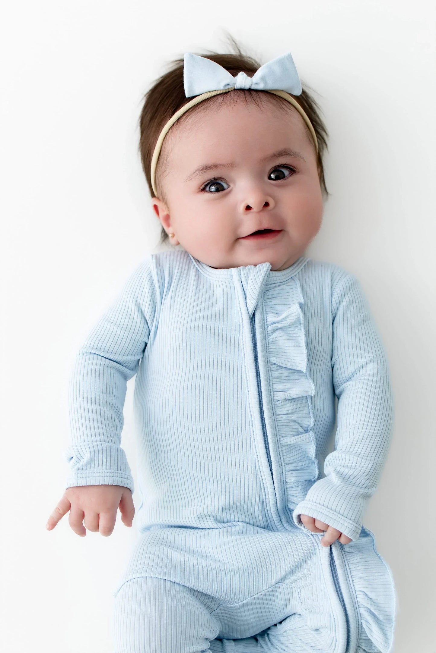 Ribbed Ruffle Zipper Footie in Breeze