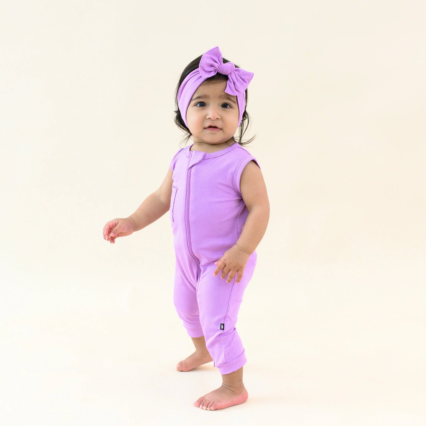 Zippered Sleeveless Romper in Poi